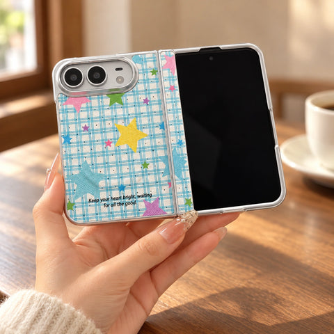 Playful Stars iPhone Duo Case, held in hand