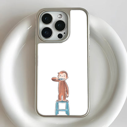 Funda para teléfono con George el curioso cepillándose los dientes
