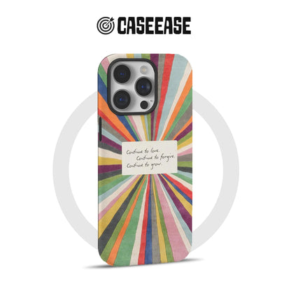 Colorful sunburst illustration with an inspirational handwritten note in the center reading: "Continue to love. Continue to forgive. Continue to grow.