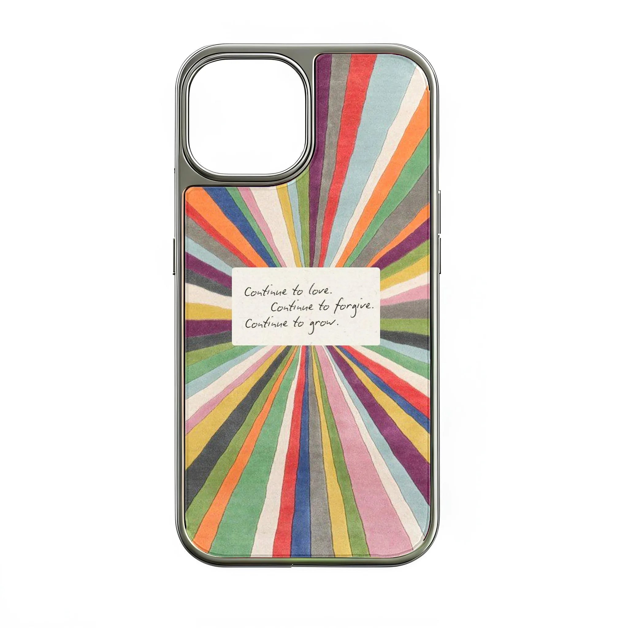 Colorful sunburst illustration with an inspirational handwritten note in the center reading: "Continue to love. Continue to forgive. Continue to grow."