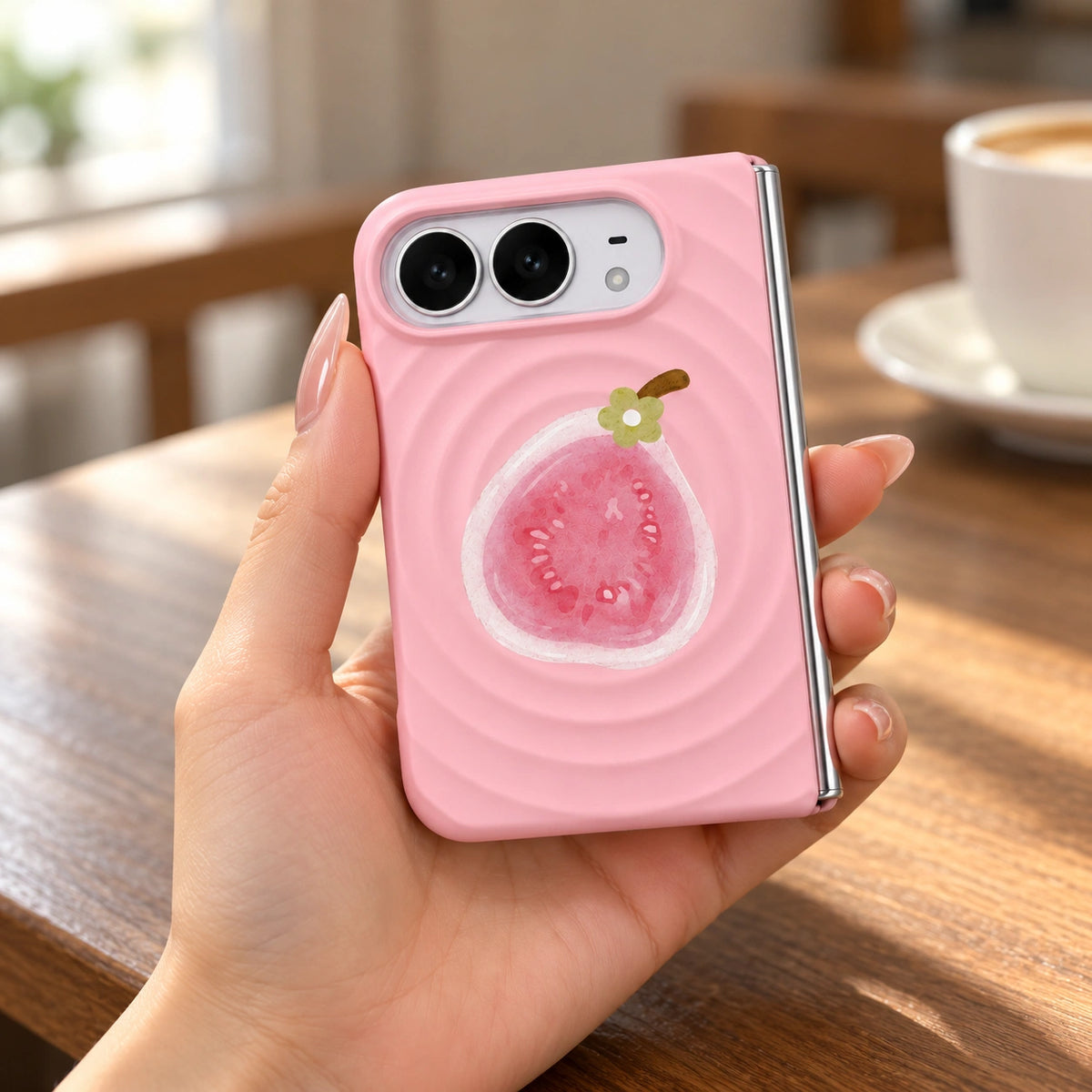 Fruit Ripple iPhone Duo Case, held in hand