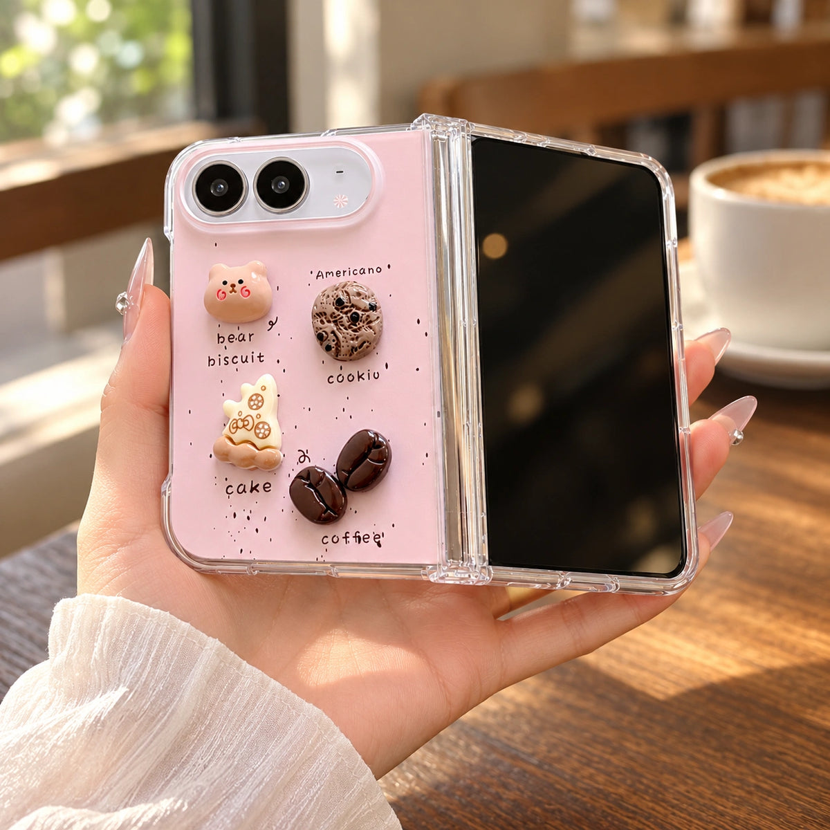 Coffee Bear Charm iPhone Duo Case, held in hand