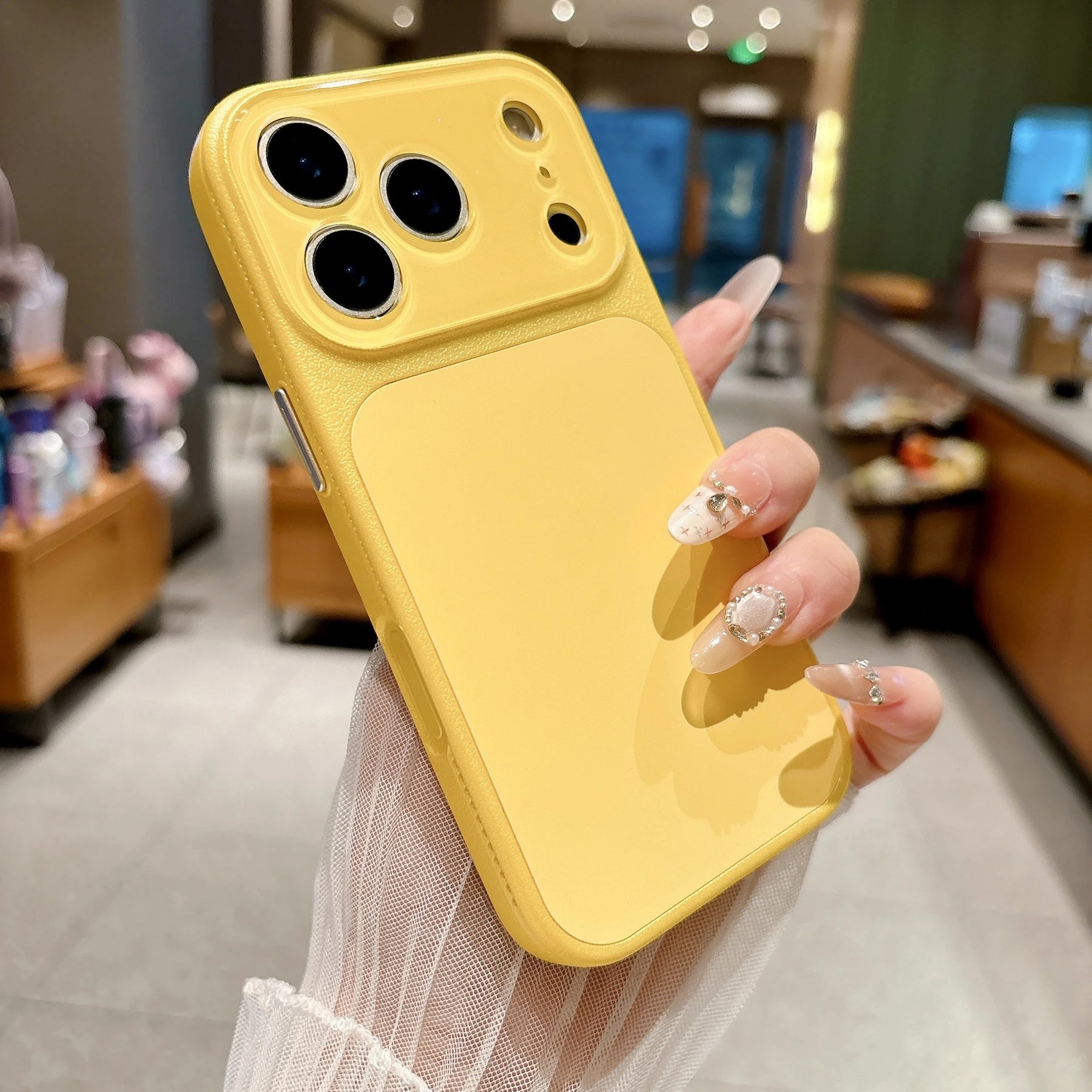 Butter yellow faux leather color block iPhone case lifestyle photo