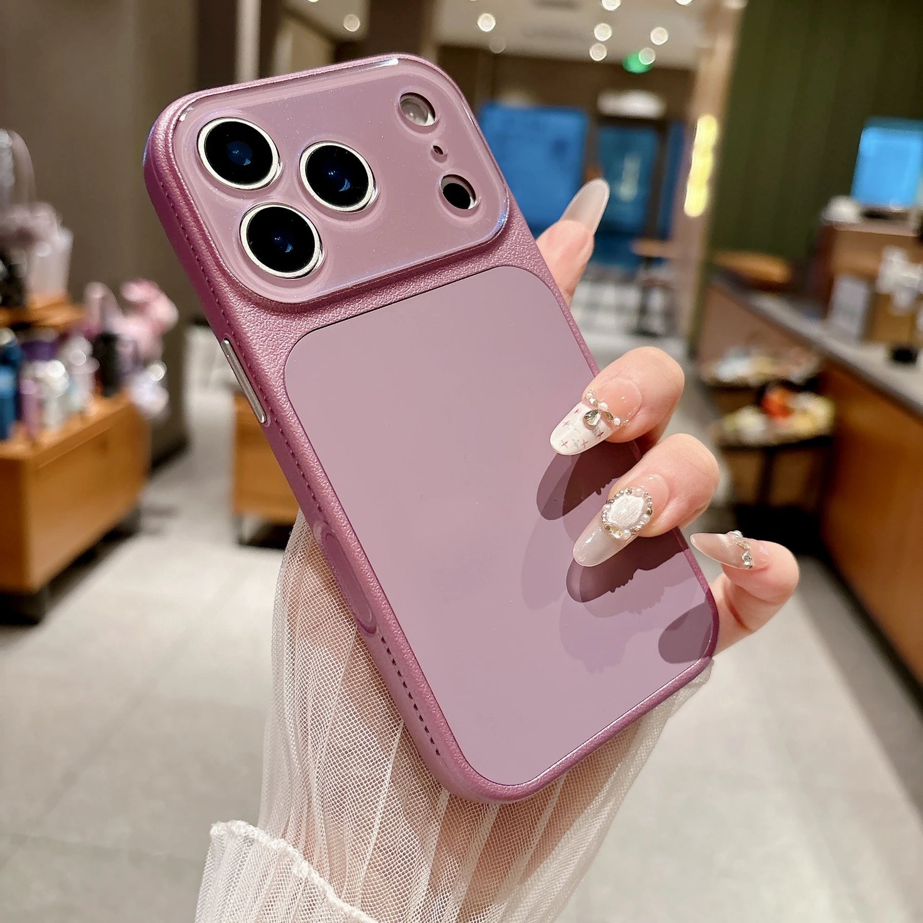 Dusty mauve faux leather color block iPhone case lifestyle photo