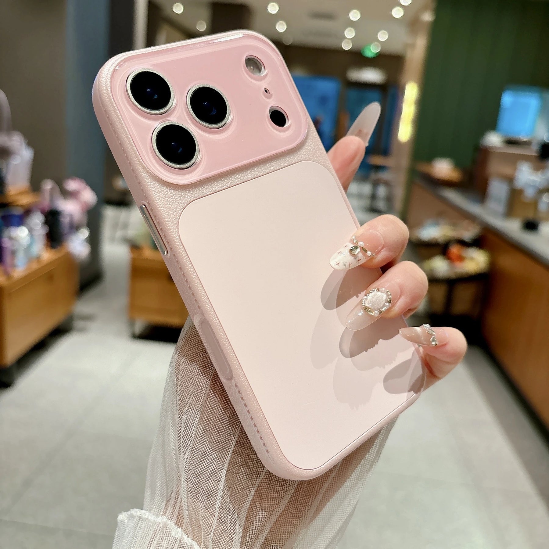 Blush pink faux leather color block iPhone case lifestyle photo